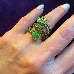 This & That Multi floral design ring  w/ shades of green cubic zirconia stones.